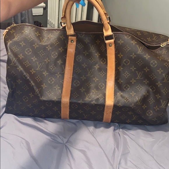 century 21 duffle bag